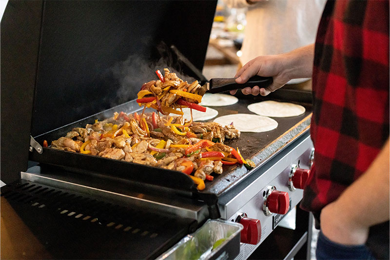 Camp Chef 4-Burner Portable Flat Top 600 Grill and Griddle Lifestyle